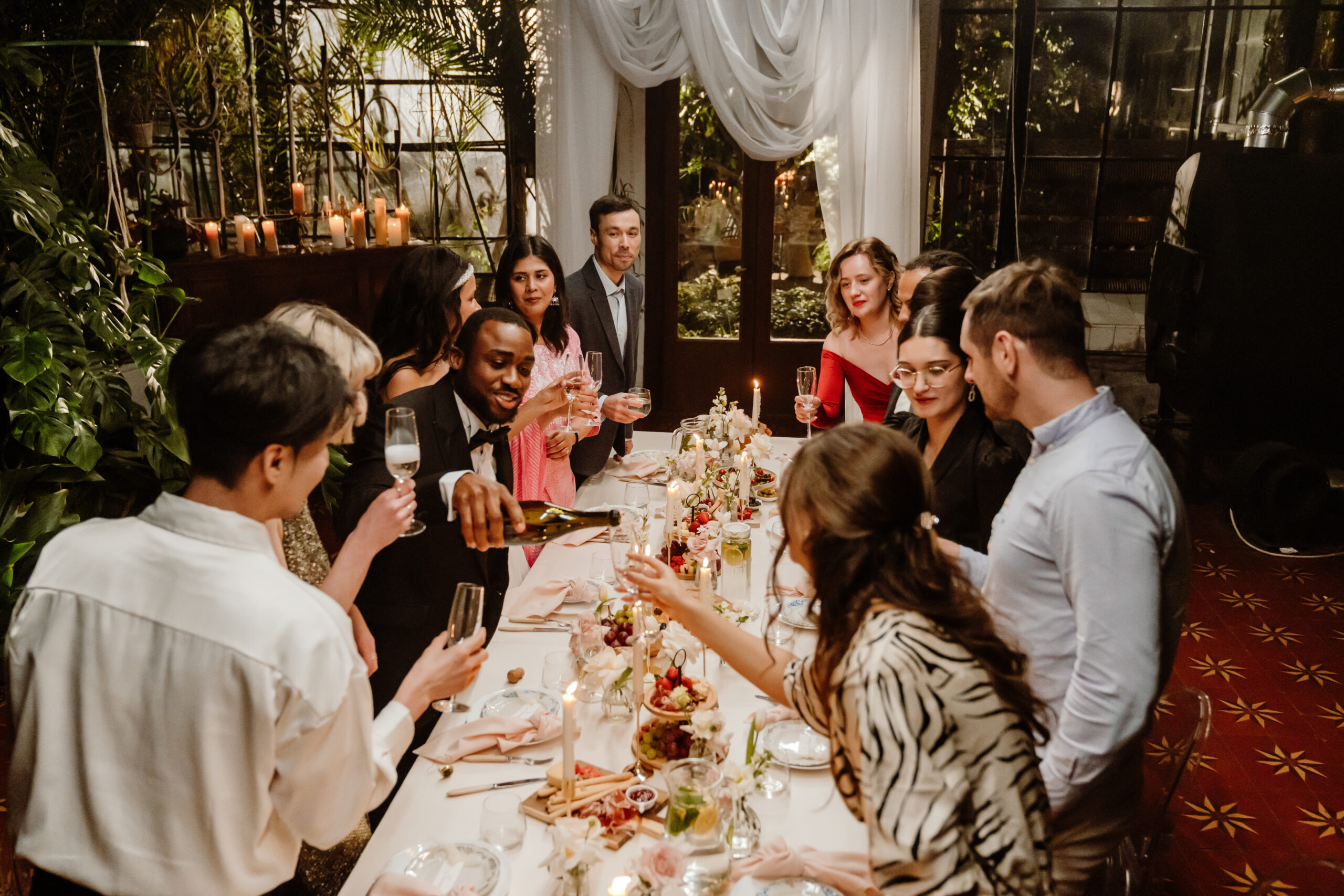 Group of people sitting at a table learning etiquettes such as Which fork do I use?
Where do I put my napkin? and other fancy dinner help for Professional Development